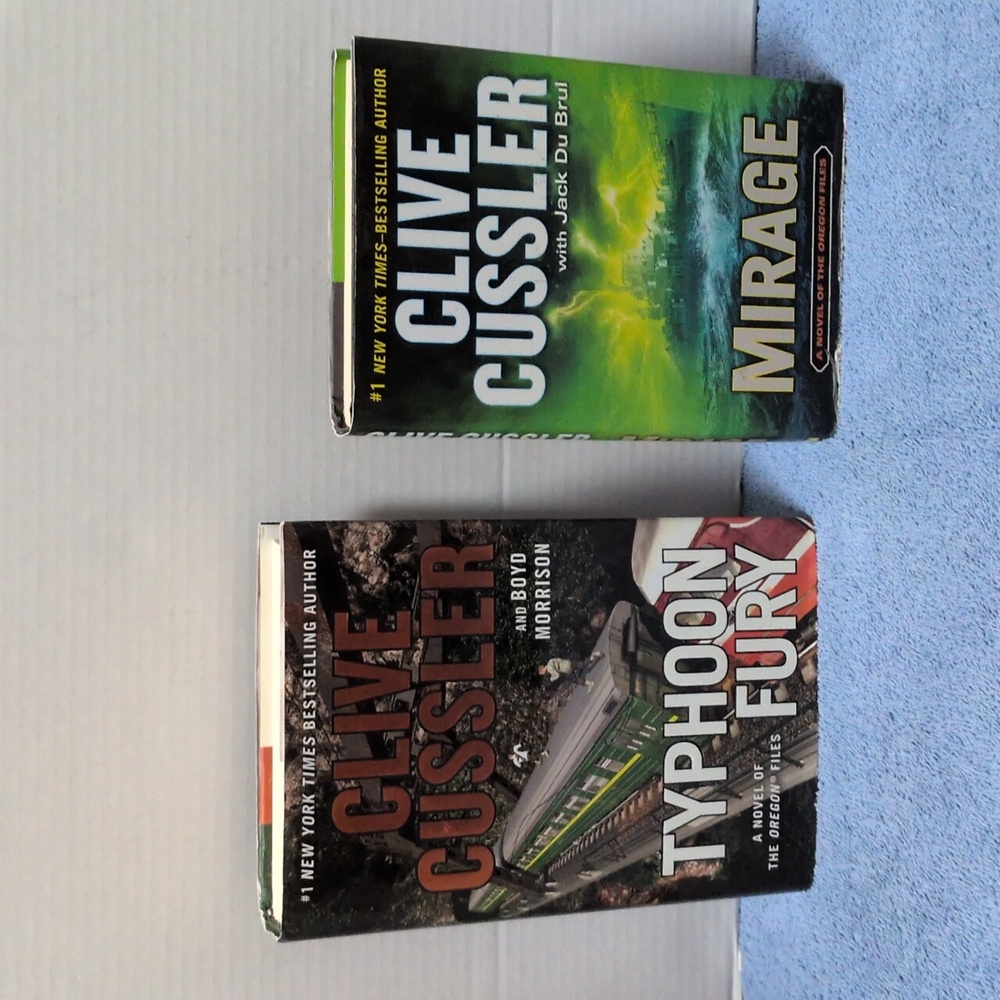 Clive Cussler Lot of 2 Hardback Books Typhoon Fury, Mirage